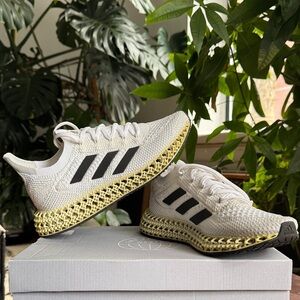 Adidas White and Black Shoes with Soft White Accents